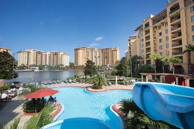 a view of a swimming pool with apartment buildings at Wyndham Bonnet Creek 3BR Apartment with Resort Access in Orlando