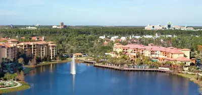 an aerial view of a resort with a fountain in the water at Wyndham Bonnet Creek 3BR Apartment with Resort Access in Orlando