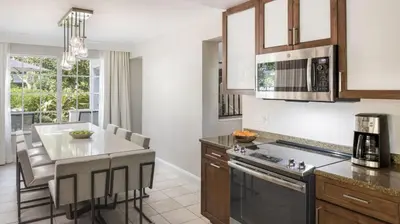 a kitchen with a stove and a counter top at Marriott's Lakeshore Reserve 3BR Apartment with Resort Access in Orlando