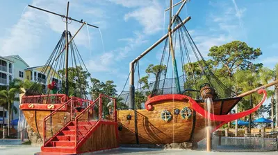 two wooden boats on display in a playground at Marriott's Harbour Lake 2BR Apartment with Resort Access in Orlando