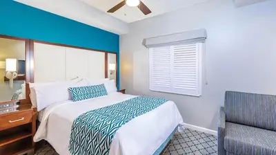 a bedroom with a large bed and a window at Marriott's Royal Palms 2BR Apartment with Resort Access in Orlando