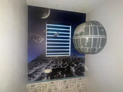 a room with a planet and a window with a planetarium at Disney Universal Theme Home! Private Pool! in Kissimmee