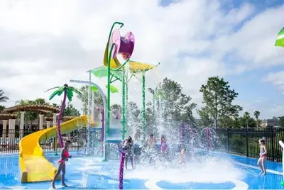 a group of people playing in a water park at Disney Home in Orlando