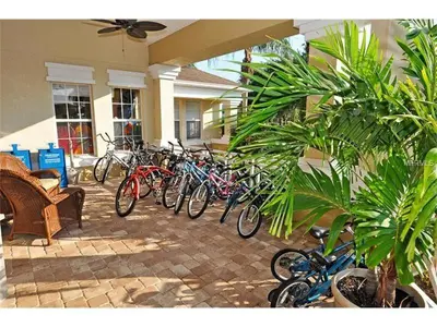 a row of bikes parked in front of a house at Perfect Disney Resort Condo in Kissimmee
