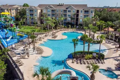 an aerial view of a pool at a resort at NEW - Paradise townhome at Windsor Hills in Orlando