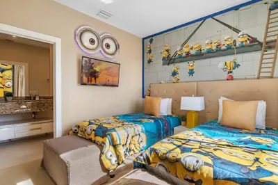 a bedroom with two beds and a map on the wall at 4 Bedrooms 45 Bathrooms Magic Village7603Rd in Orlando