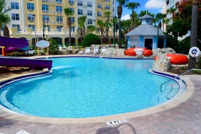 a large pool in a resort with a water park at Calypso Cay Vacation Villas in Kissimmee
