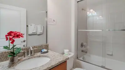 a bathroom with a sink and a shower at Storey Lake Villa in Kissimmee