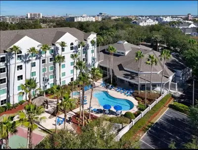 an aerial view of a resort with a swimming pool at Aqua Condo-Free Shuttle-Disney-Universal EPIC in Orlando