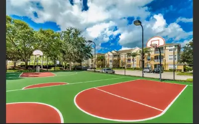 a basketball court with a basketball hoop at Apartment near Disney & UniversalEpic in Orlando