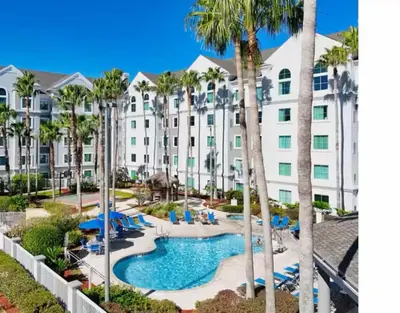 a view of the resort from the balcony at Comfy Condo near Disney-Free Shuttle to Parks in Orlando