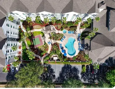 an aerial view of a resort with a swimming pool at Comfy Condo near Disney-Free Shuttle to Parks in Orlando