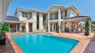 a house with a swimming pool in front of it at 24-7 Vacation Club! Affordable Vacation Stays, Multiple Units Available, All Over Florida! Name your price today! in Kissimmee