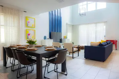 a dining room with a table and chairs at Storey Lake Resort 515 - Hosted by Top Villas in Kissimmee
