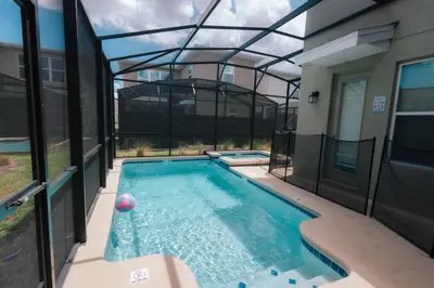 a swimming pool in a house with a glass ceiling at Storey Lake Resort 515 - Hosted by Top Villas in Kissimmee