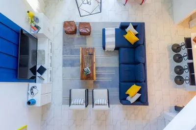 an overhead view of a living room with a blue couch at Storey Lake Resort 515 - Hosted by Top Villas in Kissimmee