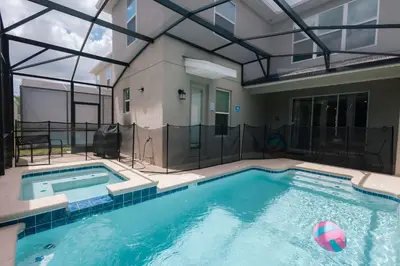 a swimming pool with a ball in the middle of it at Storey Lake Resort 515 - Hosted by Top Villas in Kissimmee