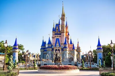 a disney castle in the middle of a park at Disney's Old Key West Resort in Orlando