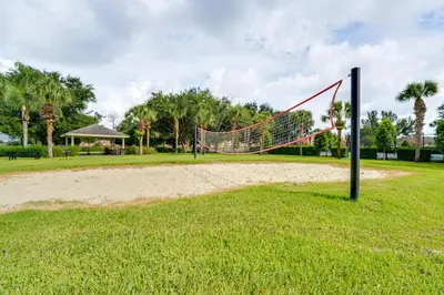 a volley ball hoop in a park at 4 Mi to Disney Family-Friendly Resort Getaway! in Orlando