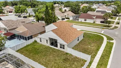 an aerial view of a house with houses at Upstay 3BR Family-Friendly Stylish Retreat w Patio in Kissimmee