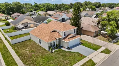 an overhead view of a house in a residential neighborhood at Upstay 3BR Family-Friendly Stylish Retreat w Patio in Kissimmee
