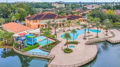 an aerial view of a resort with a water park at Waterfront ParadiseClose 2 DisneyGated Community in Orlando