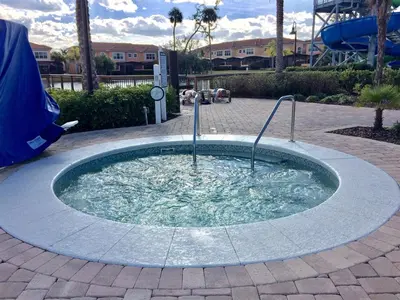 a small circular pool of water in a park at Waterfront ParadiseClose 2 DisneyGated Community in Orlando