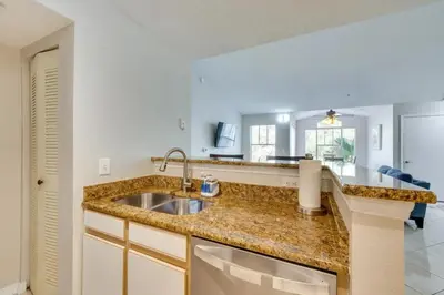 a kitchen with a sink and a counter top at Villa Velera in Kissimmee