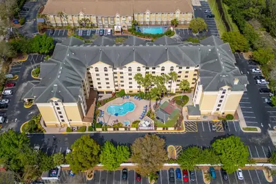 an aerial view of a resort with a pool at Harry Potter Stay Near Universal in Orlando