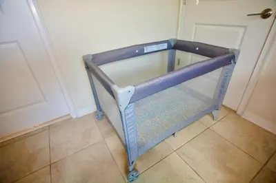 a blue cart in front of a door at Storey Lake Resort Condo next to Disney in Kissimmee