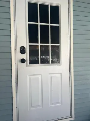 a white door with a window on a house at Cozy Private Cottage Only 5 miles from Disney in Kissimmee