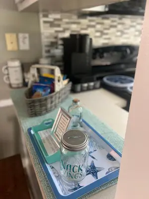 a counter top with a can of micky wings on it at Cozy Private Cottage Only 5 miles from Disney in Kissimmee