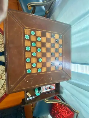 a wooden board with a chess game in it at Orlando 4 bedroom Family Retreat in Orlando