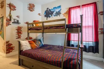 a bedroom with two bunk beds and a window at 4 Luxurious Suites Near Theme Parks and Downtown in Orlando