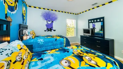 a bedroom with two beds and a tv at Private 6 Bed 4 Bath Villa- Cozy family vacation home sleeps up to 12 guests in Orlando