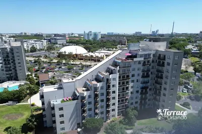 an aerial view of a city with tall buildings at Boho Chic Garden Condo 7 Min to Universal Parks in Orlando