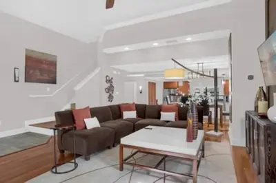 a living room with a couch and a table at Perfect Summer Escape - Townhome by Disney in Orlando