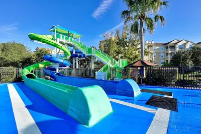 a water park with a water slide at Windsor Hills Resort - Water Park - Private Heated Plunge Pool - Near Disney in Orlando