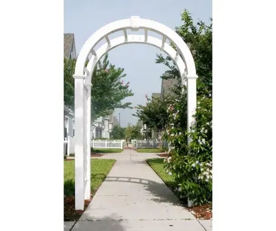 an archway over a sidewalk in a yard at Townhome Near Disney Mid Term rentals Welcome in Kissimmee