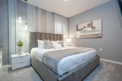 a bedroom with a large bed in a room at Disney Private Pool Game Room Themed Bedrooms. Book Now PG20 in Orlando