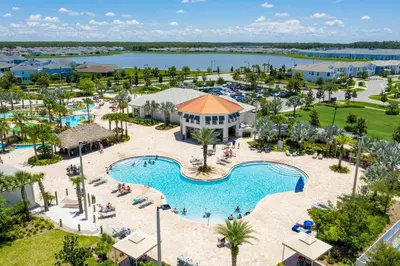 an aerial view of a pool at a resort at Disney Getaway Townhouse with Private Pool. Book Now SLR484 in Kissimmee