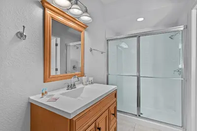 a bathroom with a sink and a shower at Disney Getaway Townhouse with Private Pool. Book Now VC304 in Orlando