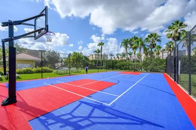 a basketball court with a basketball hoop at Disney Getaway Townhouse with Private Pool. Book Now VC304 in Orlando