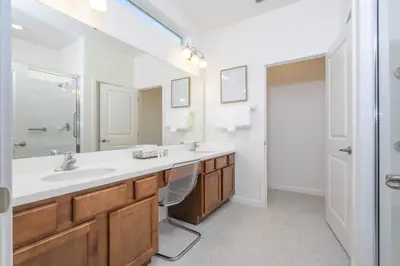 a bathroom with a sink and a shower at Disney Getaway Private Pool Themed Bedrooms. Book Now BV241 in Kissimmee