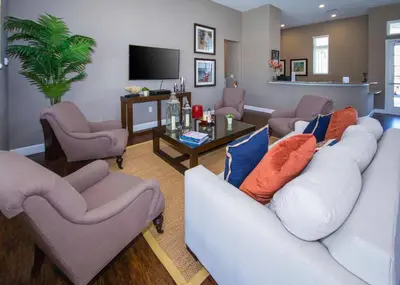 a living room with couches and a tv at Disney Getaway Private Pool Themed Bedrooms. Book Now WLV5 in Kissimmee