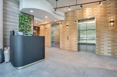 a lobby with a reception desk in a building at 3 bedroom Corner Suite in Orlando