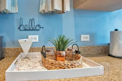 a tray with a basket on top of a counter at 2 Bdrm Penthouse with Billiards in Orlando