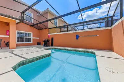 a swimming pool in the middle of a building at 8847 Candy Palm Rd in Kissimmee