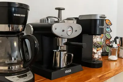 a coffee maker sitting on top of a counter at Single Story Villa with Pool Views and Family Fun in Orlando