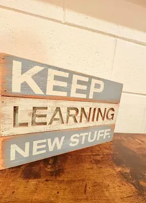 a keep learning new stuff sign on a wall at Modern Studio with Exterior Independent Entrance in Orlando